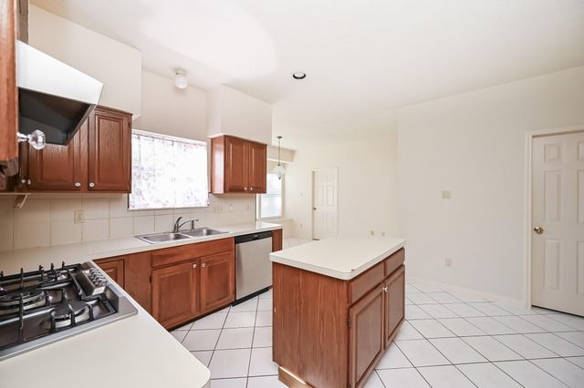 9731 New Kent Drive, Sugar Land, TX 77498