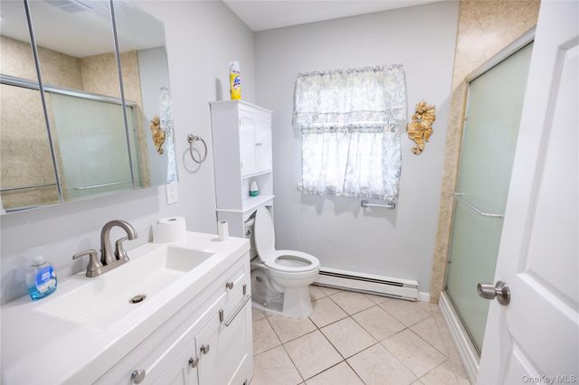250A Newcastle Court, Ridge, NY 11961