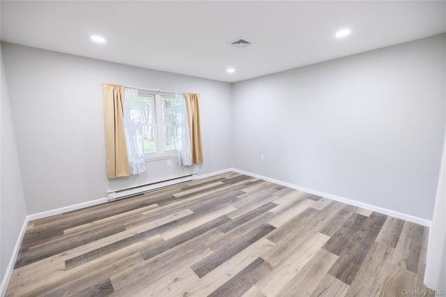 250A Newcastle Court, Ridge, NY 11961