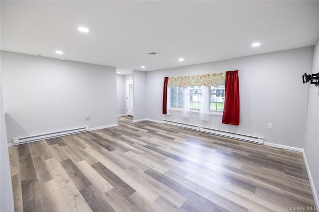 250A Newcastle Court, Ridge, NY 11961
