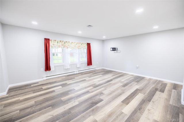 250A Newcastle Court, Ridge, NY 11961