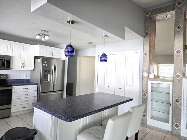 1011 SE Spinnaker Avenue, Port St. Lucie, Port St Lucie, FL 34983