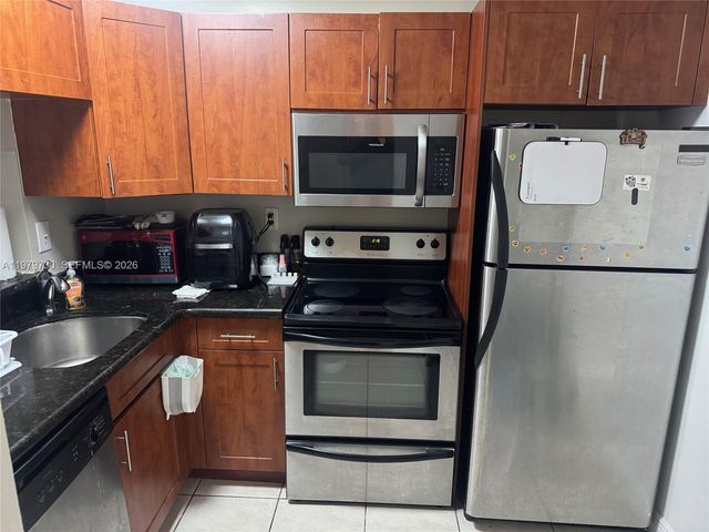 494 NW 165th St Rd C-208, Miami, FL 33169