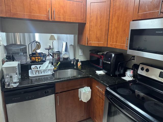 494 NW 165th St Rd C-208, Miami, FL 33169