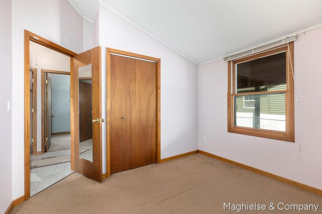 9048 Loveless Drive Ne, Courtland Twp, MI 49341