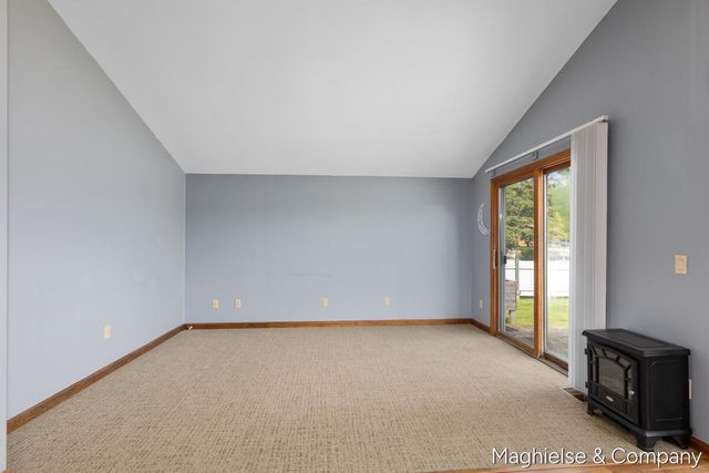 9048 Loveless Drive Ne, Courtland Twp, MI 49341