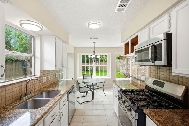 18607 Hiddenbay Way, Spring, TX 77379