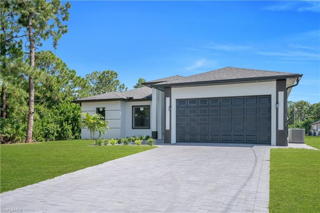 3909 25th ST SW, LEHIGH ACRES, FL 33976 — photo 4