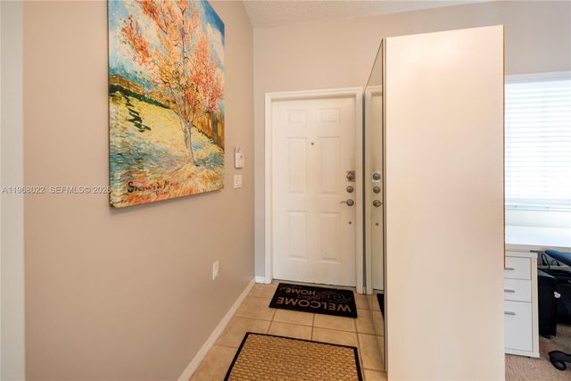 2151 NW 77th Way 203, Pembroke Pines, FL 33024