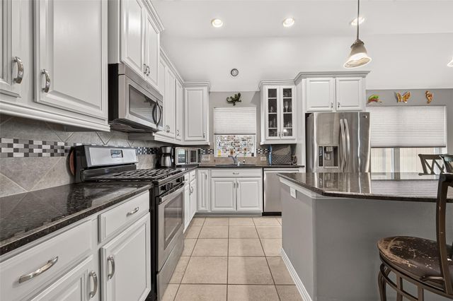 20234 Fossil Valley Lane, Cypress, TX 77433