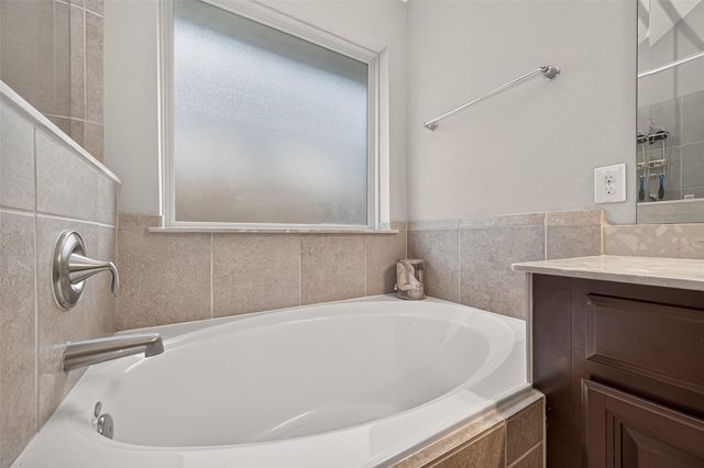 20234 Fossil Valley Lane, Cypress, TX 77433