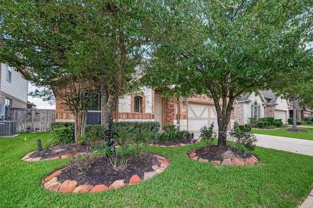 20234 Fossil Valley Lane, Cypress, TX 77433