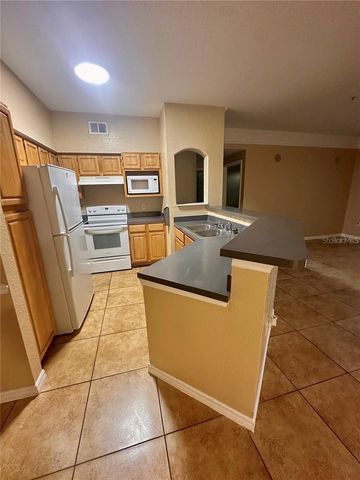 3280 SOHO STREET 207, Orlando, FL 32835