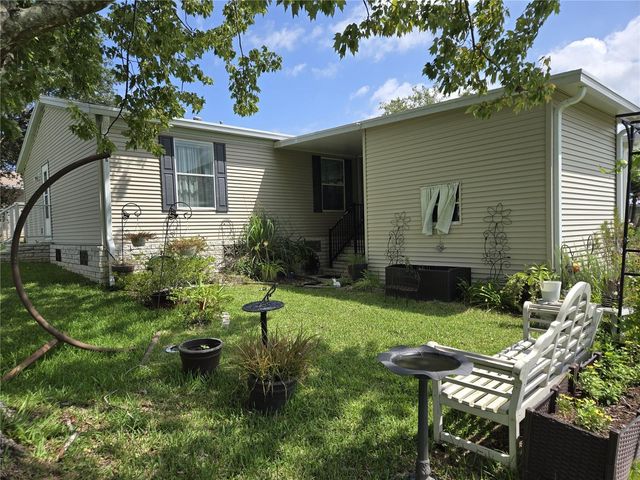 2723 LAKE GRASSMERE CIRCLE 910, Zellwood, FL 32798