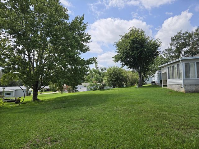 2723 LAKE GRASSMERE CIRCLE 910, Zellwood, FL 32798
