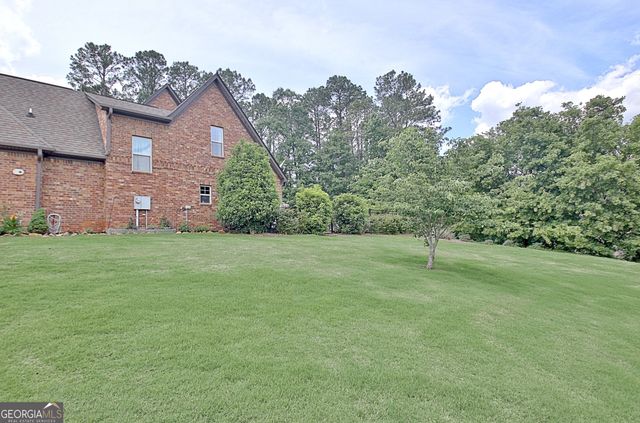100 Woodcanoe Court, Peachtree City, GA 30269