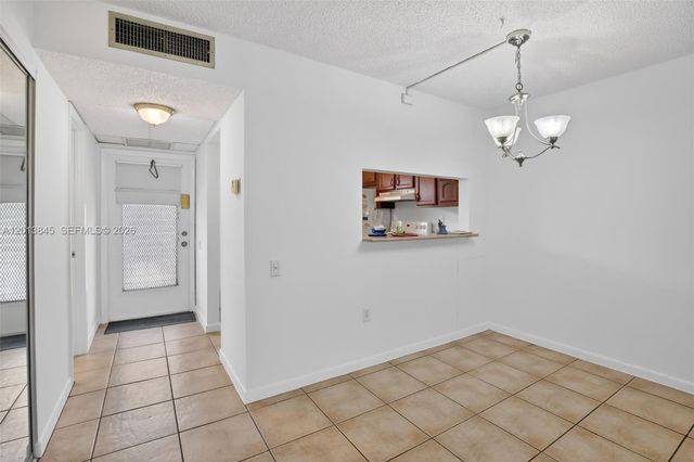 9090 Lime Bay Boulevard 203, Tamarac, FL 33321