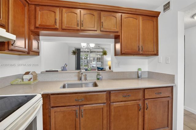 9090 Lime Bay Boulevard 203, Tamarac, FL 33321