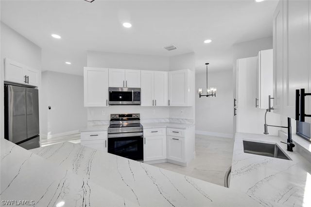 1222 Hilliard ST E, Lehigh Acres, FL 33974