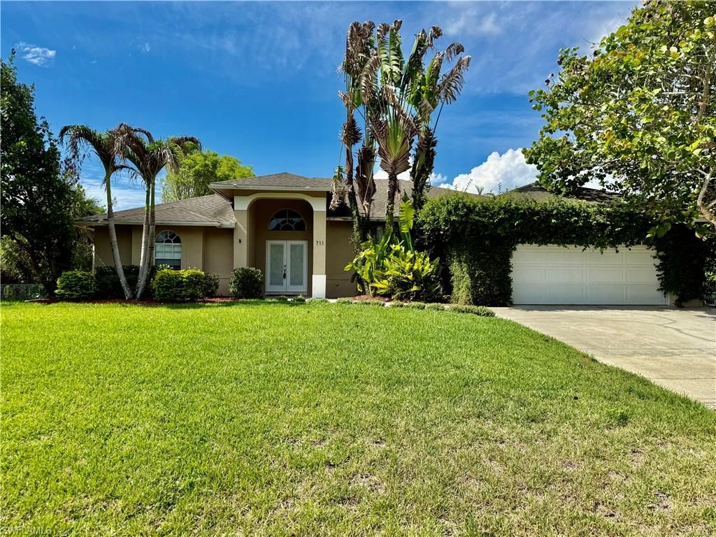 711 Sawyer ST, LEHIGH ACRES, FL 33974 — exterior