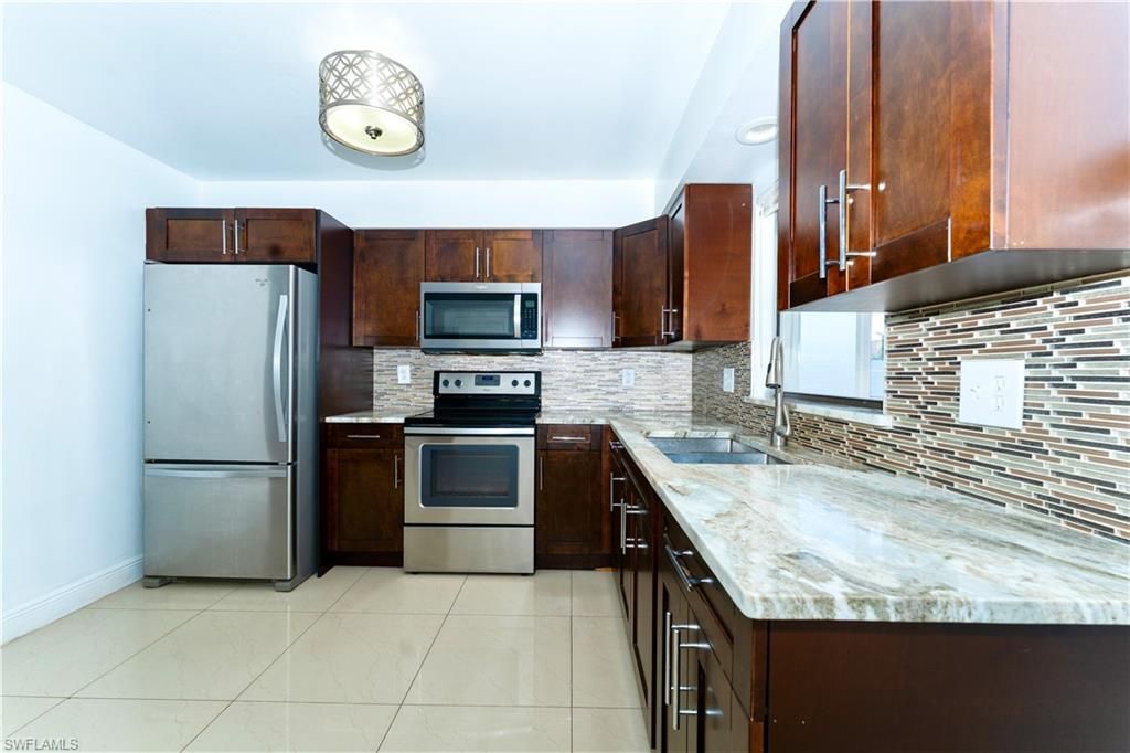224 NE 9th TER, CAPE CORAL, FL 33909 — photo 5