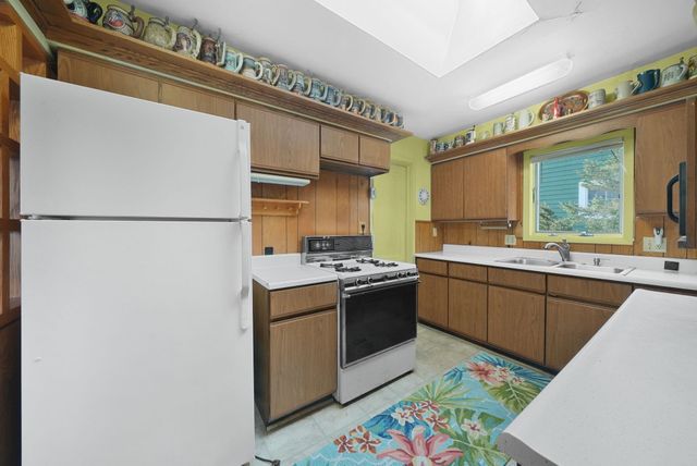 235 E Lake Mitchell Drive, Cherry Grove Twp, MI 49601