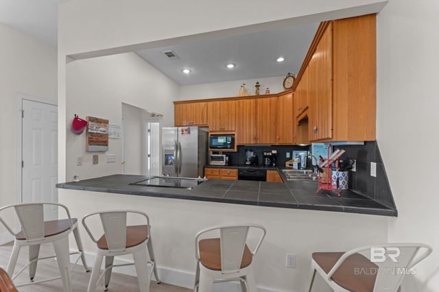 8888 Dolphin Lane, Gulf Shores, AL 36542