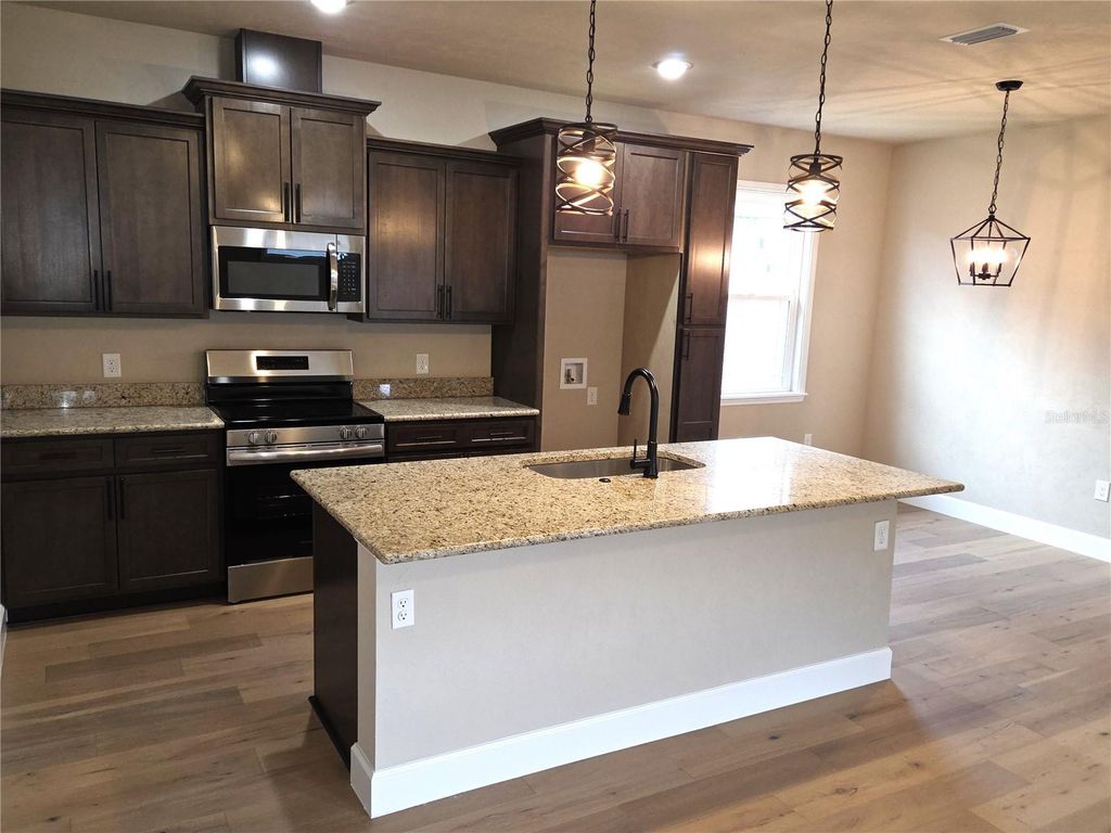 Image 5 of property listing at 24338 SW 18TH LANE, Newberry, FL 32669