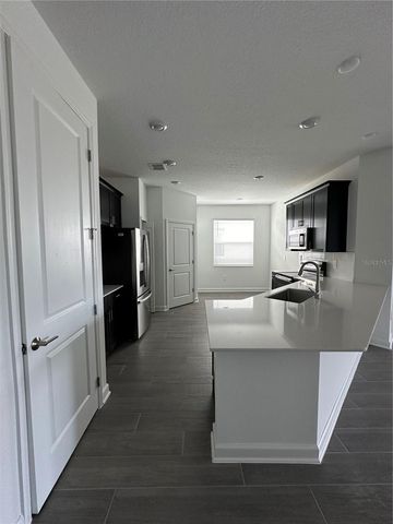 1656 CONTENTMENT LOOP, Kissimmee, FL 34744