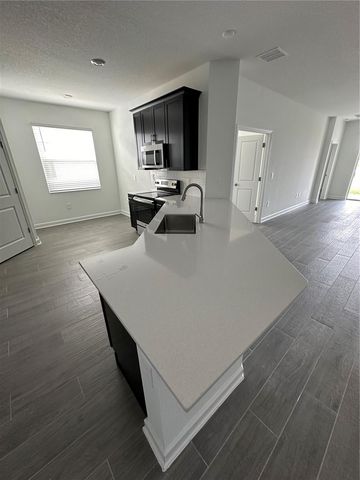 1656 CONTENTMENT LOOP, Kissimmee, FL 34744