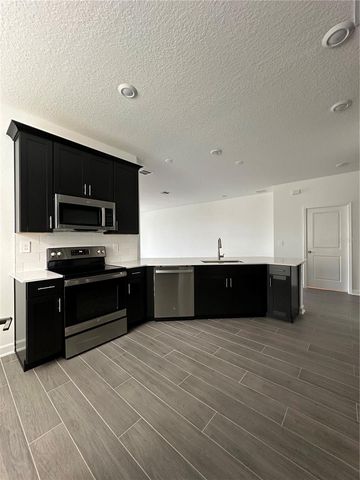 1656 CONTENTMENT LOOP, Kissimmee, FL 34744