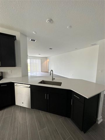 1656 CONTENTMENT LOOP, Kissimmee, FL 34744