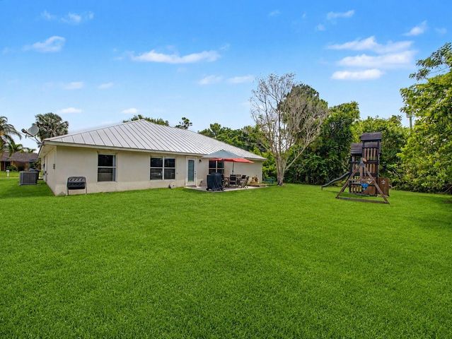 1550 SW Kosnar Avenue, Port St. Lucie, FL 34953