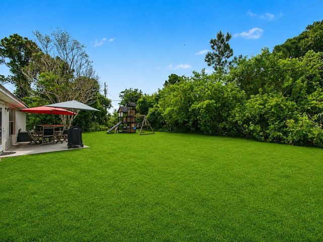 1550 SW Kosnar Avenue, Port St. Lucie, FL 34953
