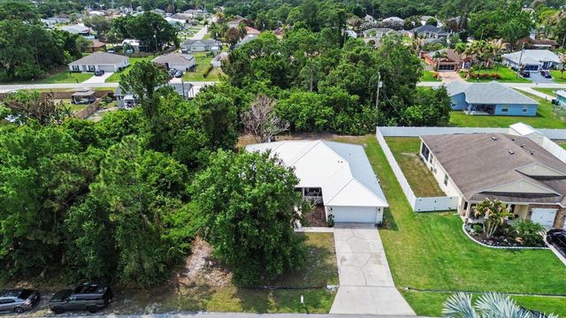 1550 SW Kosnar Avenue, Port St. Lucie, FL 34953