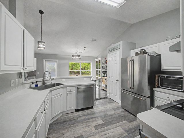 1550 SW Kosnar Avenue, Port St. Lucie, FL 34953