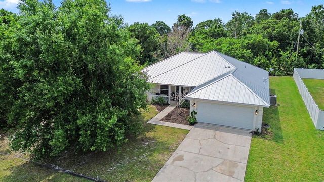 1550 SW Kosnar Avenue, Port St. Lucie, FL 34953