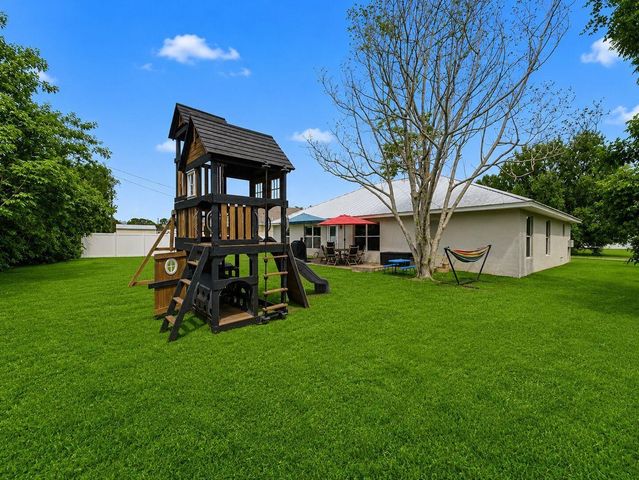 1550 SW Kosnar Avenue, Port St. Lucie, FL 34953