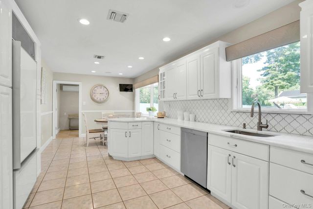 65 Shoreham Drive E, Dix Hills, NY 11746