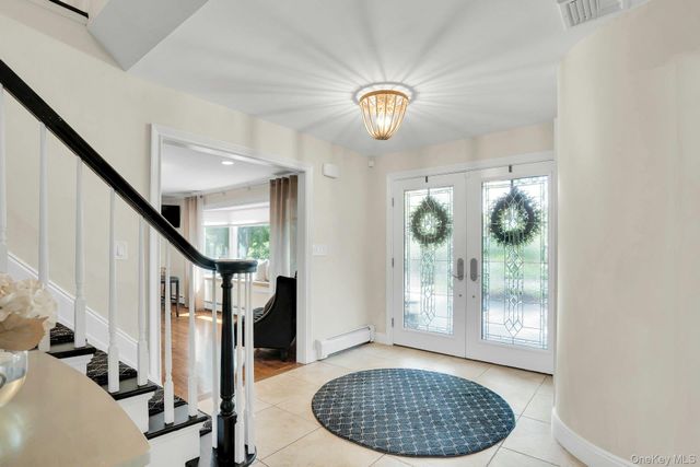 65 Shoreham Drive E, Dix Hills, NY 11746