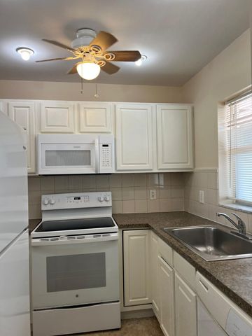 9851 SANDALFOOT Boulevard 212, Boca Raton, FL 33428