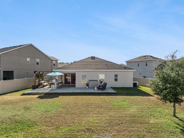 1040 GOLDEN DAWN LOOP, Minneola, FL 34715