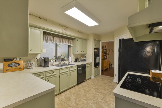 3114 Falling Brook Drive, Kingwood, TX 77345