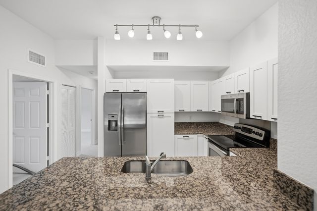 58 SE Palermo Court 104, Stuart, FL 34994