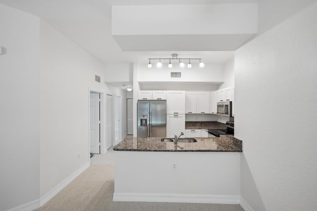 58 SE Palermo Court 104, Stuart, FL 34994