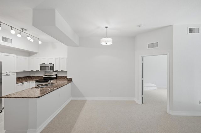 58 SE Palermo Court 104, Stuart, FL 34994