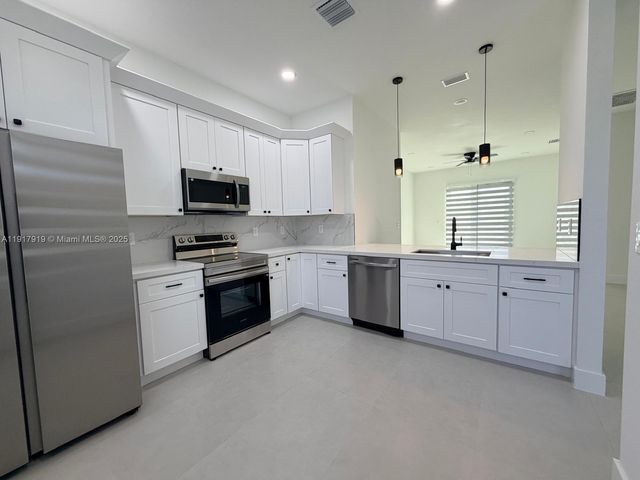 1144 Mobley ST E, Lehigh Acres, FL 33974