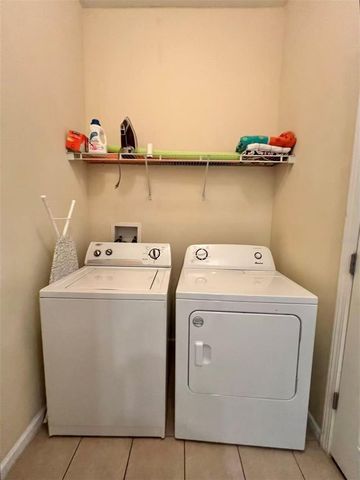 5257 CANE ISLAND LOOP 402, Kissimmee, FL 34746