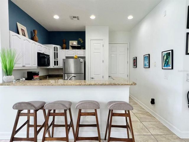 5257 CANE ISLAND LOOP 402, Kissimmee, FL 34746