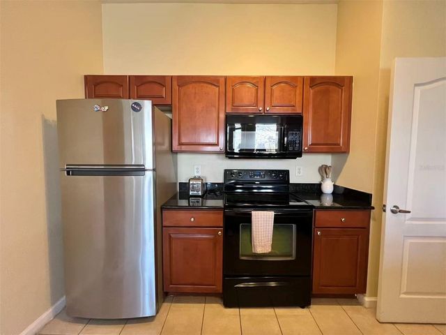 5257 CANE ISLAND LOOP 402, Kissimmee, FL 34746